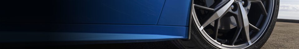Close-up view of a high-performance tire of a performance vehicle.
