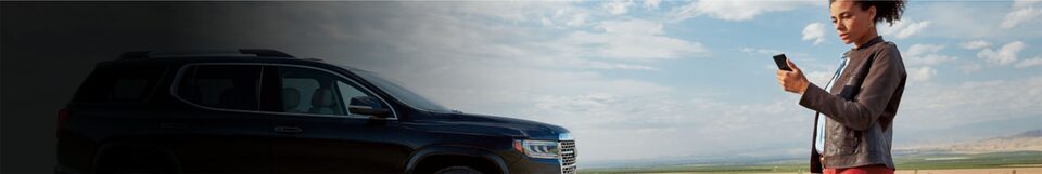 A vehicle on the side of the road requiring roadside assistance.