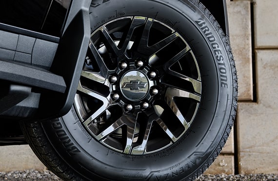 Poster about GM's Tire & Wheel Protection Plan.
