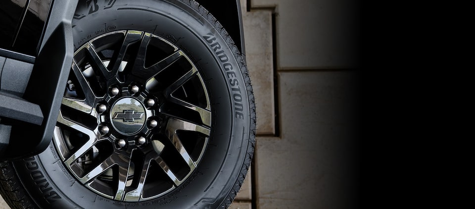 Poster about GM's Tire, Wheel and Chrome Protection Plan.